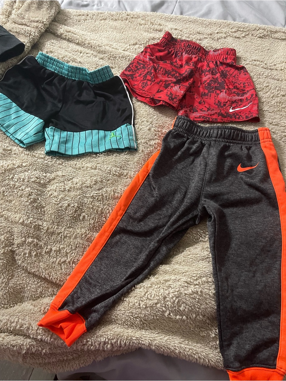 Nike Kids Charcoal Gray Joggers with Bright Orange Trim
